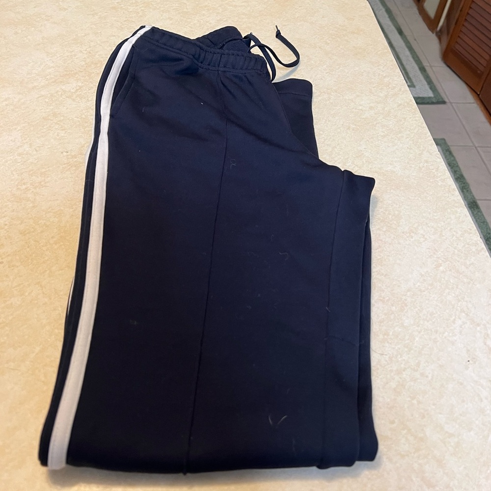 Aeropostale track pants. Navy blue. Size small. Pockets, zippered legs.
